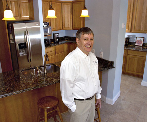 Russ Outsen expanded his existing remodeling business by purchasing a Kitchen Solvers franchise.